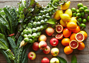 a group of fruits and vegetables on a wood surface Healthy Weight Loss Diets Telford