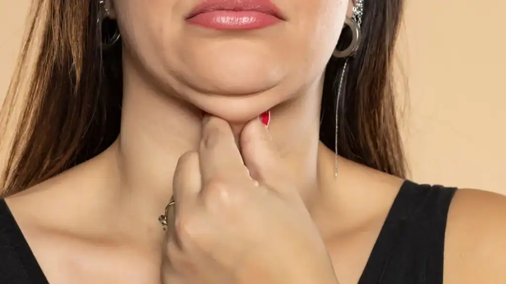 An image of a woman with double chin, sad, worried : Non Surgical Double Chin Removal Treatment in Telford, UK